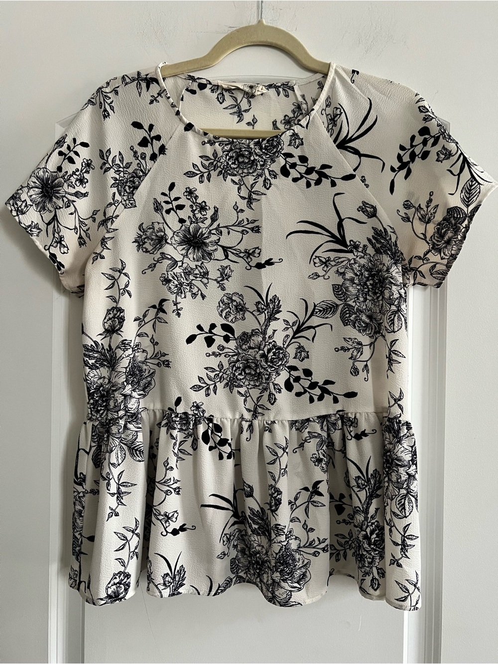 everleigh Black Floral Peplum Top on Cream